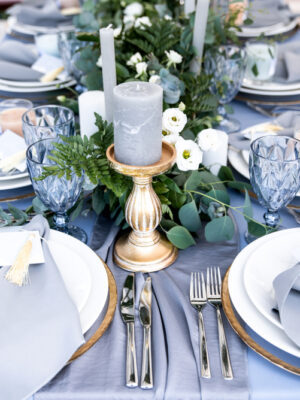 Festive,Table,Decorated,With,Garland,Of,Branches,And,Flowers,On